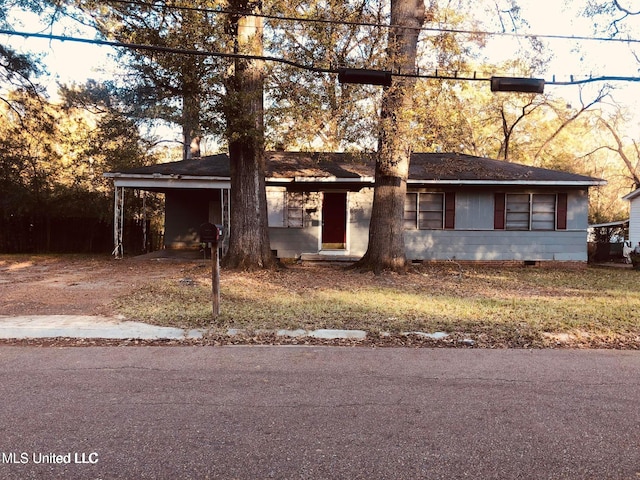 view of front of house featuring a carport