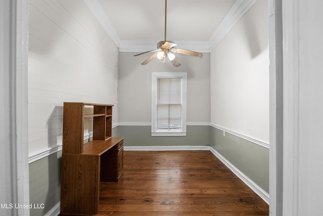 interior space featuring baseboards, ornamental molding, dark wood-style flooring, and a ceiling fan