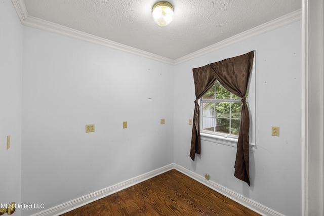 empty room with baseboards, ornamental molding, a textured ceiling, and dark wood-style flooring