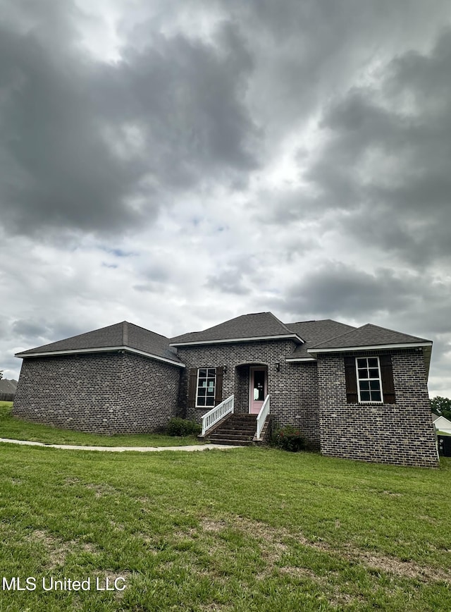 8 Shade Tree Dr, Carriere, MS 39426 - ranch-style home featuring a front lawn and brick siding