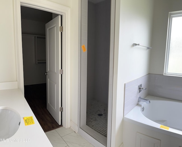 8 Shade Tree Dr, Carriere, MS 39426 - full bath with a stall shower, a bath, marble look tile flooring, and vanity
