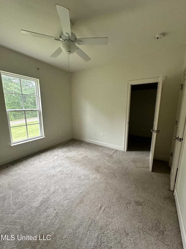 8 Shade Tree Dr, Carriere, MS 39426 - unfurnished room featuring carpet, a ceiling fan, a smoke detector, and baseboards
