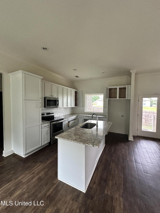 8 Shade Tree Dr, Carriere, MS 39426 - kitchen with stainless steel appliances, a sink, crown molding, dark wood-type flooring, and light stone counters