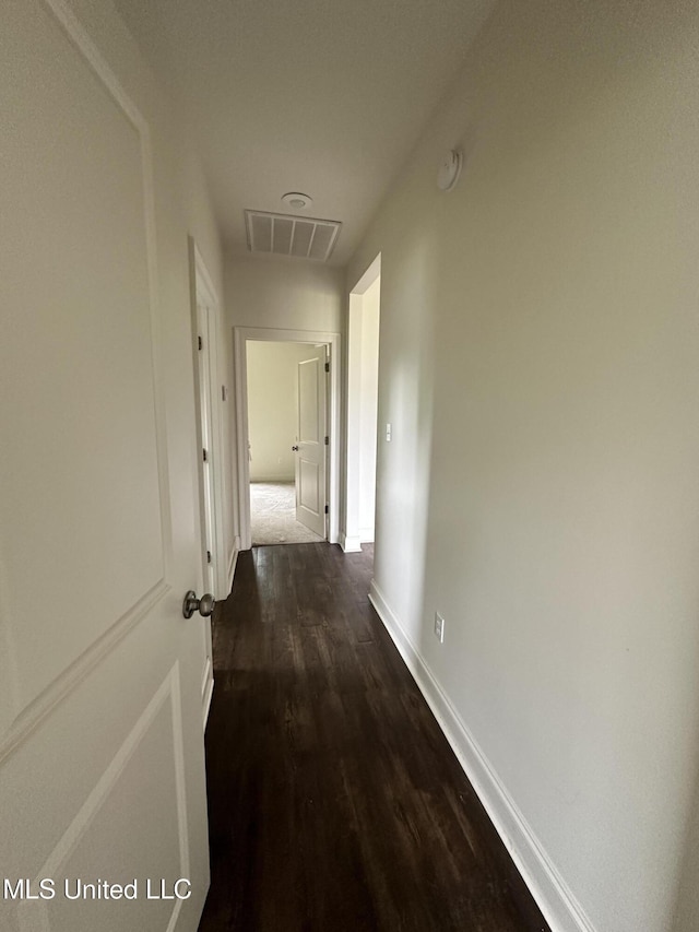 8 Shade Tree Dr, Carriere, MS 39426 - corridor with dark wood-style flooring and baseboards
