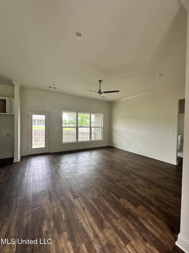 8 Shade Tree Dr, Carriere, MS 39426 - unfurnished living room with ceiling fan, dark wood-style flooring, and baseboards