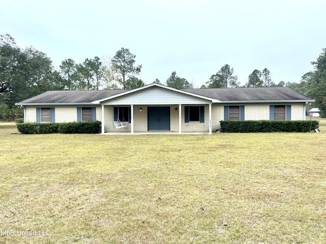 single story home with covered porch and a front yard