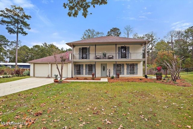 view of front facade featuring a balcony, a garage, a front lawn, and a porch