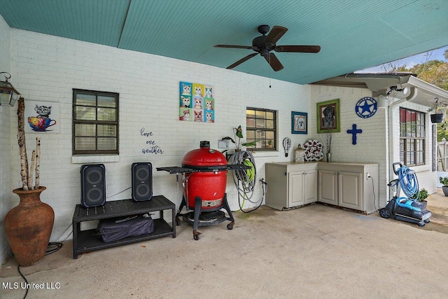 view of patio with ceiling fan