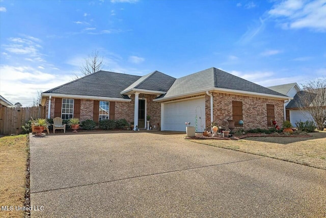 ranch-style home featuring a garage