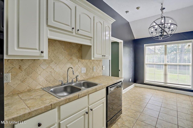 kitchen featuring lofted ceiling, baseboards, a chandelier, a sink, and dishwasher