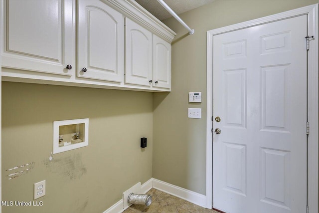 laundry area with washer hookup, electric dryer hookup, tile patterned flooring, cabinet space, and baseboards