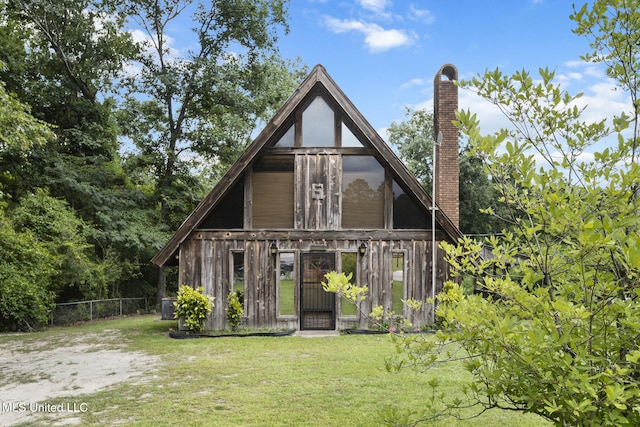 48 Brady Rd, Petal, MS 39465 - rear view of property featuring a chimney and an outbuilding