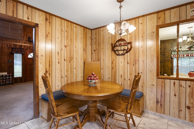 48 Brady Rd, Petal, MS 39465 - dining room with a chandelier, wooden walls, and crown molding