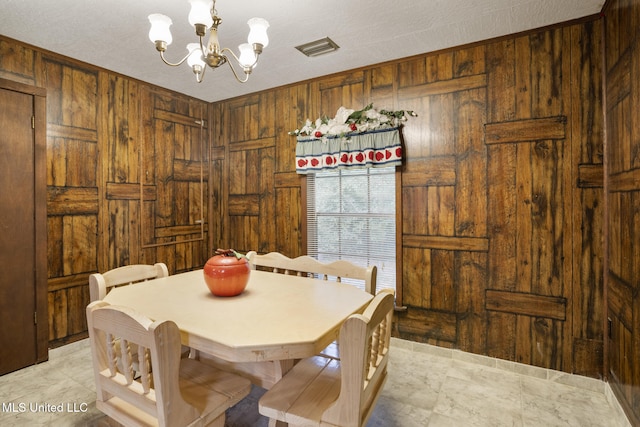 48 Brady Rd, Petal, MS 39465 - dining area with wood walls and a chandelier