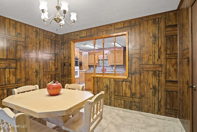 48 Brady Rd, Petal, MS 39465 - dining area with wooden walls and a chandelier