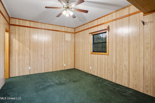 48 Brady Rd, Petal, MS 39465 - carpeted empty room featuring a ceiling fan and wood walls