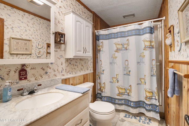 48 Brady Rd, Petal, MS 39465 - bathroom with wallpapered walls, wainscoting, vanity, wooden walls, and a textured ceiling
