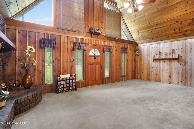 48 Brady Rd, Petal, MS 39465 - entryway with carpet floors, wooden walls, plenty of natural light, a ceiling fan, and high vaulted ceiling