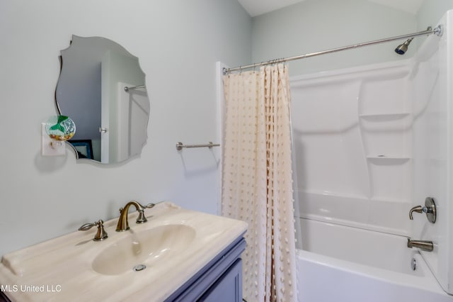 full bath with shower / tub combo and vanity