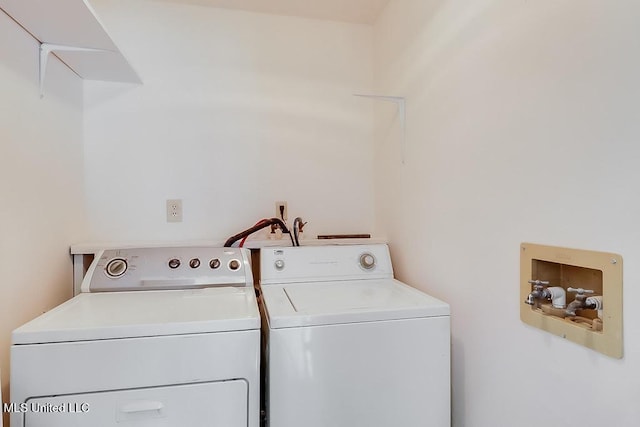 laundry area with washer and clothes dryer