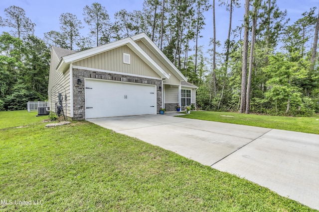 view of front of house featuring an attached garage, concrete driveway, board and batten siding, a front lawn, and central AC unit