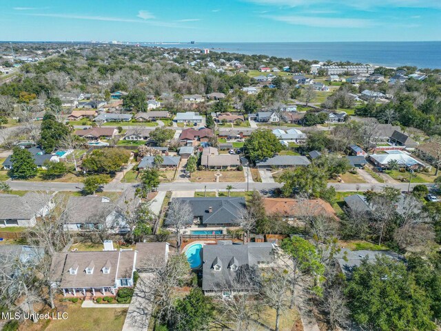 bird's eye view featuring a residential view and a water view