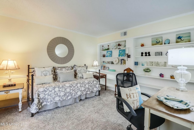 carpeted bedroom with visible vents and ornamental molding