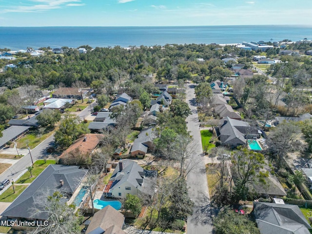 aerial view featuring a residential view and a water view