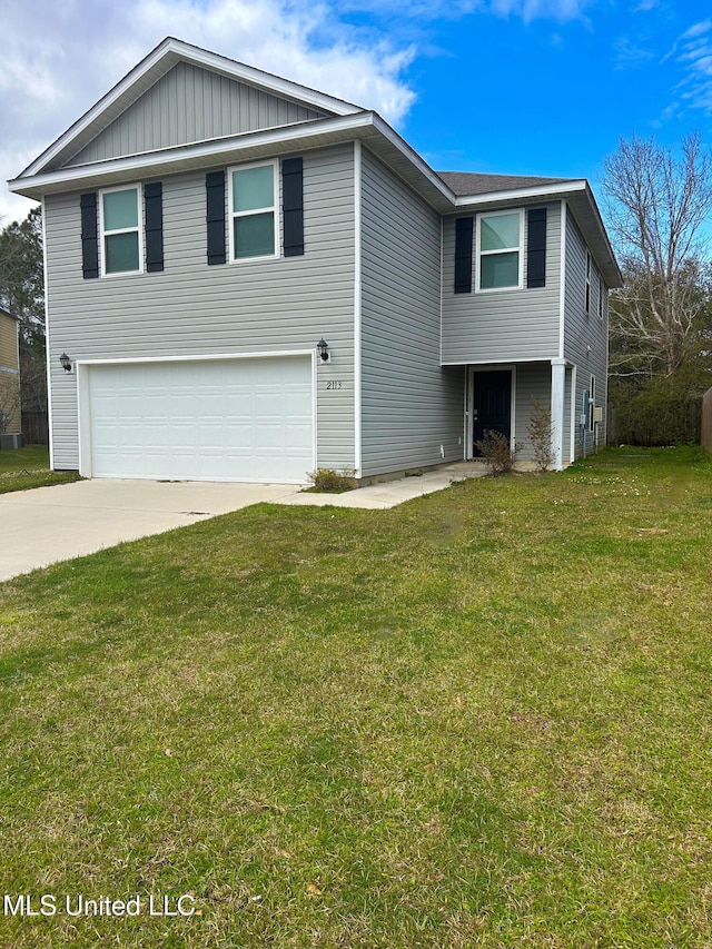 view of front of home with board and batten siding, a front yard, a garage, and driveway