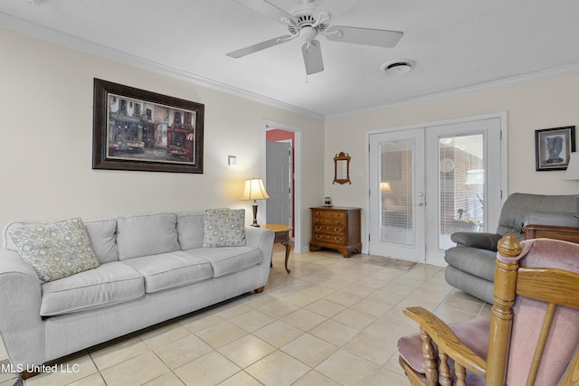 living area with ceiling fan, light tile patterned flooring, crown molding, and french doors