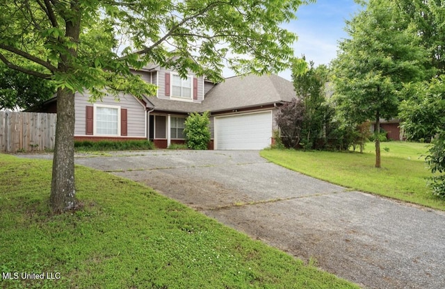 7669 Meadow Ridge Ln, Olive Branch, MS 38654 - view of front of property featuring driveway, an attached garage, and brick siding