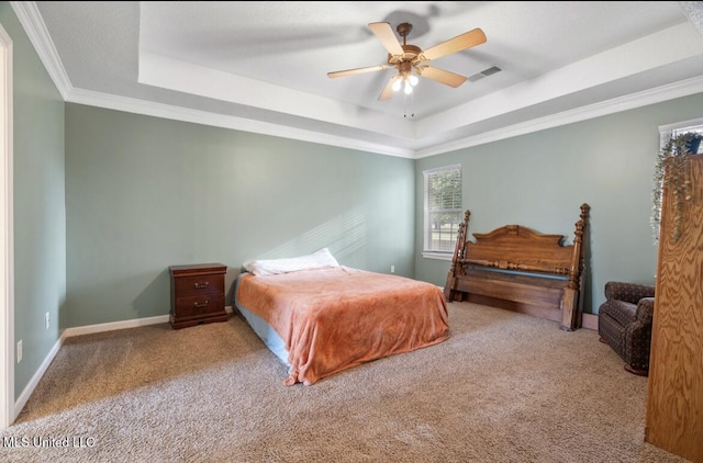 7669 Meadow Ridge Ln, Olive Branch, MS 38654 - carpeted bedroom with a tray ceiling, crown molding, baseboards, and a ceiling fan
