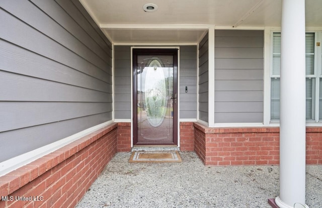 7669 Meadow Ridge Ln, Olive Branch, MS 38654 - view of exterior entry with brick siding