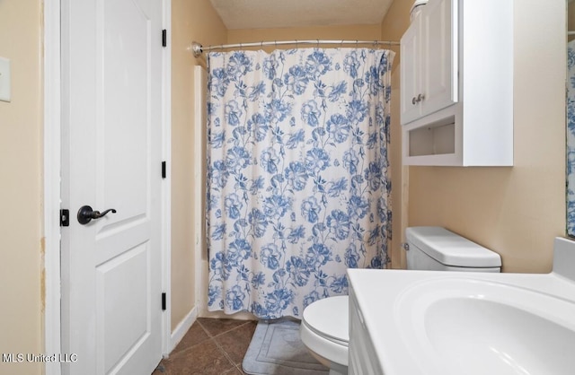 7669 Meadow Ridge Ln, Olive Branch, MS 38654 - full bath featuring toilet, vanity, a shower with shower curtain, and tile patterned flooring