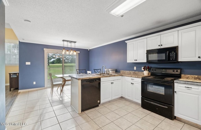 7669 Meadow Ridge Ln, Olive Branch, MS 38654 - kitchen with black appliances, a peninsula, a textured ceiling, white cabinets, and crown molding