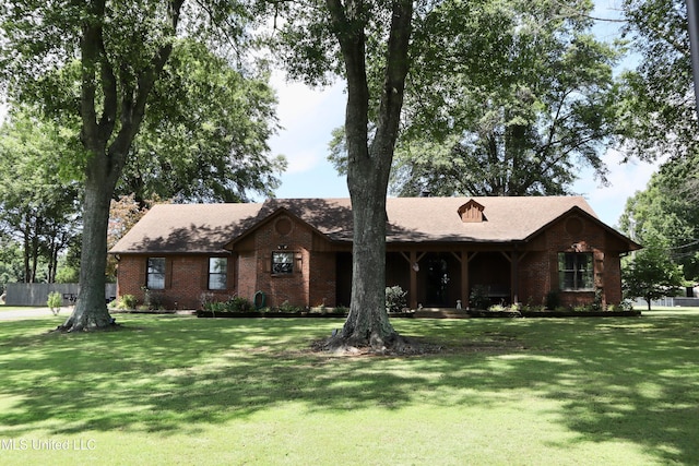 2440 E Church Rd, Southaven, MS 38671 - view of front of house featuring brick siding and a front lawn