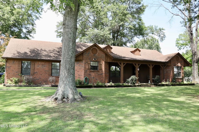 2440 E Church Rd, Southaven, MS 38671 - view of front of home with a front yard and brick siding