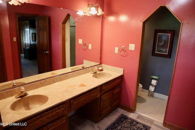 2440 E Church Rd, Southaven, MS 38671 - full bathroom featuring double vanity and toilet