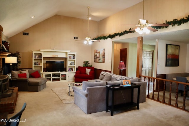 2440 E Church Rd, Southaven, MS 38671 - carpeted living area with a ceiling fan and high vaulted ceiling