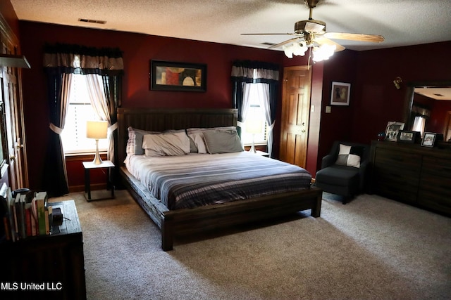 2440 E Church Rd, Southaven, MS 38671 - bedroom featuring light colored carpet, a textured ceiling, and ceiling fan