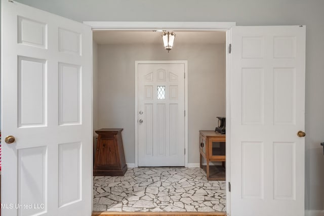 view of tiled foyer entrance