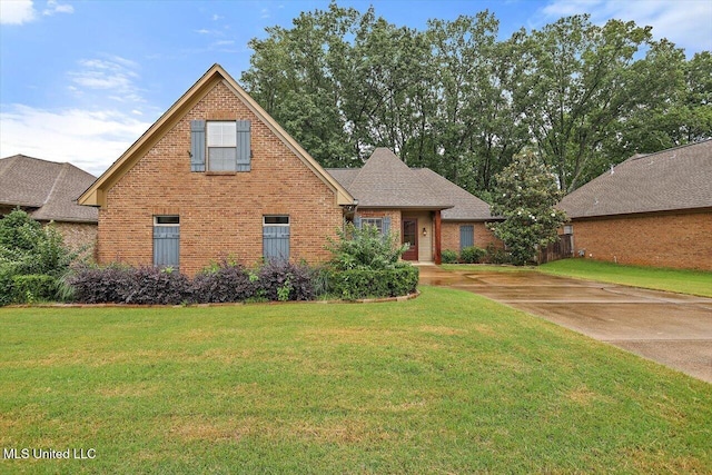 131 Stillhouse Creek Dr, Madison, MS 39110 - traditional-style house featuring brick siding and a front lawn