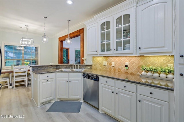 131 Stillhouse Creek Dr, Madison, MS 39110 - kitchen with dishwasher, a sink, white cabinets, glass insert cabinets, and decorative backsplash