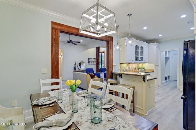 131 Stillhouse Creek Dr, Madison, MS 39110 - dining room featuring crown molding, light wood-style floors, recessed lighting, a ceiling fan, and baseboards