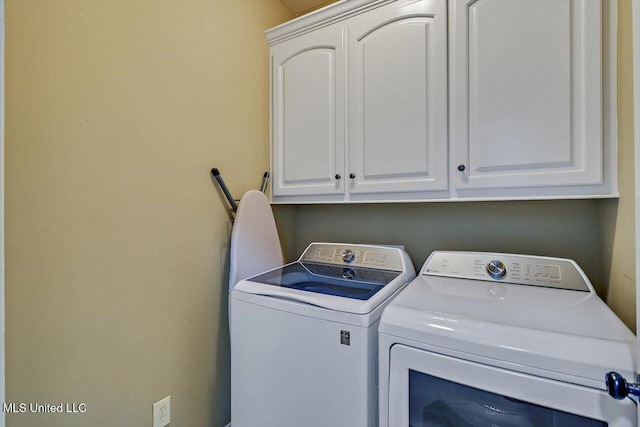 131 Stillhouse Creek Dr, Madison, MS 39110 - laundry area with washing machine and clothes dryer and cabinet space
