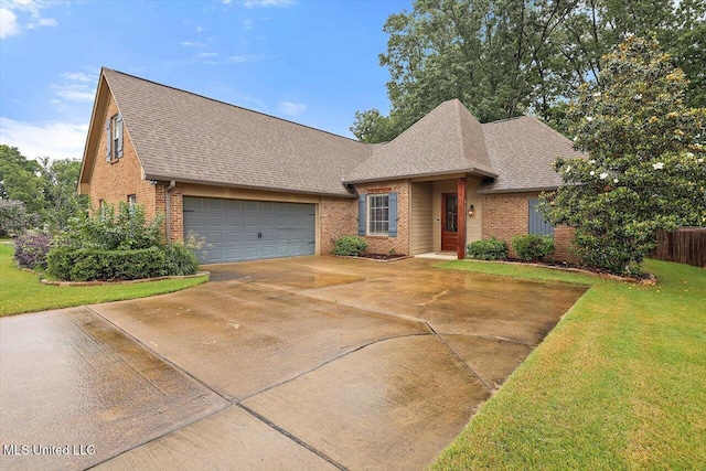 131 Stillhouse Creek Dr, Madison, MS 39110 - view of front of home featuring brick siding, a shingled roof, concrete driveway, and a garage