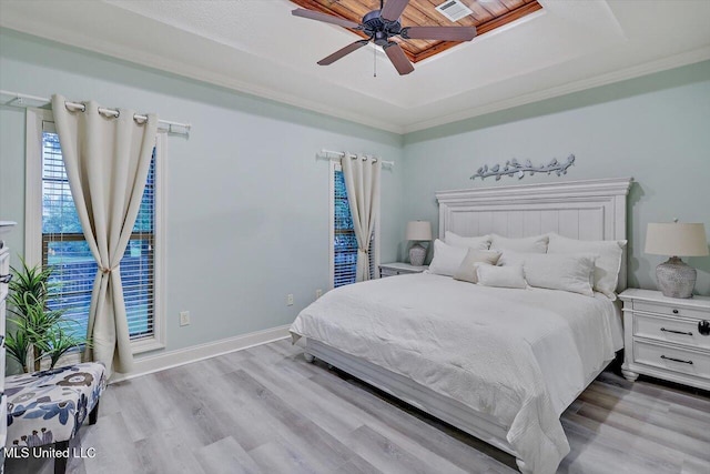 131 Stillhouse Creek Dr, Madison, MS 39110 - bedroom with a tray ceiling, wood finished floors, ceiling fan, and baseboards