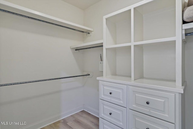 131 Stillhouse Creek Dr, Madison, MS 39110 - walk in closet featuring light wood finished floors