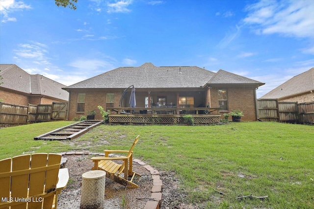 131 Stillhouse Creek Dr, Madison, MS 39110 - rear view of property featuring brick siding and a vegetable garden