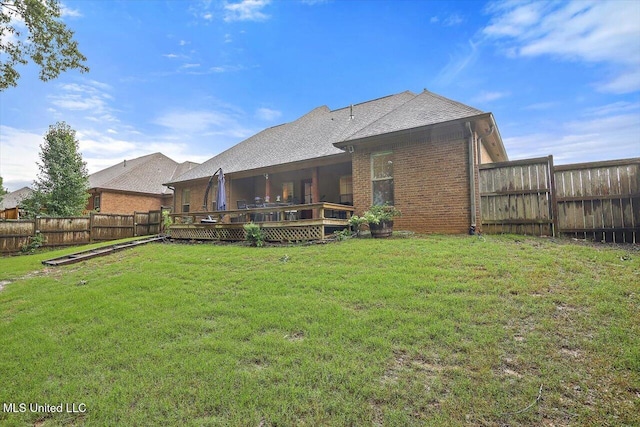131 Stillhouse Creek Dr, Madison, MS 39110 - back of house with a deck, brick siding, and roof with shingles